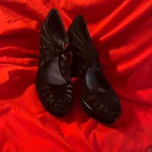 Size 9 Nine West Peep toed black platform heels